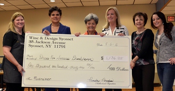Ladies with large charity check