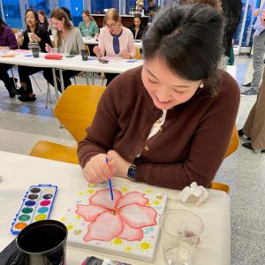 Painting Cherry Blossoms at PGIM's International Women's Day Celebration